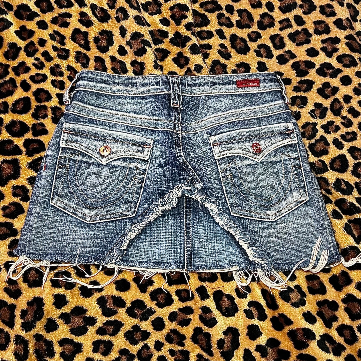 (2) Distressed Denim Mini Skirt
